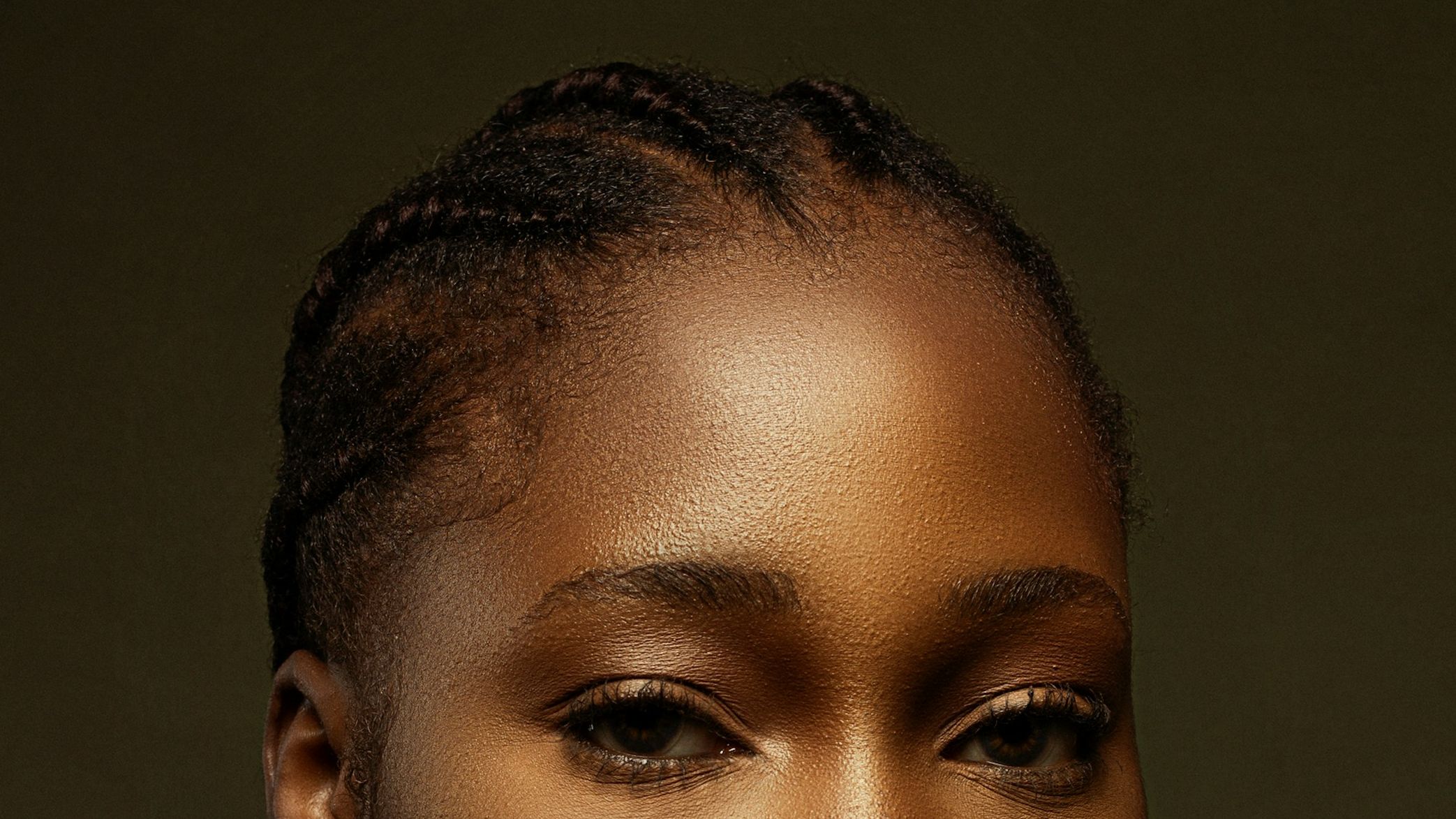 Brows mapped and drawn on a client before microshading, with guide marks still visible